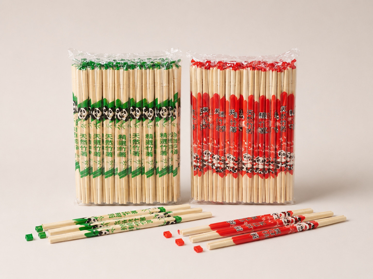 Packaged bamboo chopsticks with red and green printed wrappers